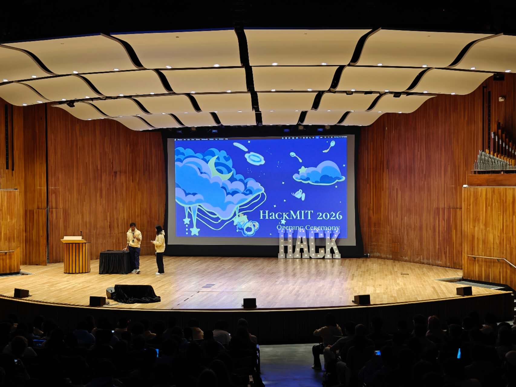 HackMIT 2026 opening ceremony in an MIT auditorium